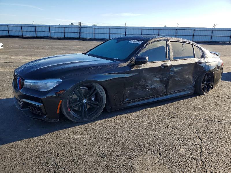 BMW 740 I 2016 with VIN WBA7E2C54GG548343 - Photo from auction