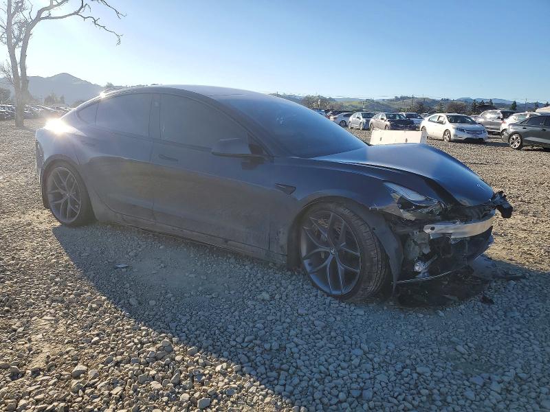 Photo 4 from auction – 2021 TESLA MODEL 3 with VIN 5YJ3E1EB4MF003103