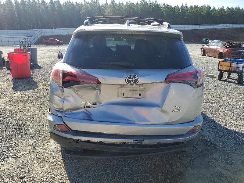 Photo 6 from auction – 2018 TOYOTA RAV4 LE with VIN JTMBFREV9JJ231376