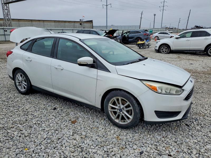 Photo 4 from auction – 2015 FORD FOCUS with VIN 1FADP3F23FL240146