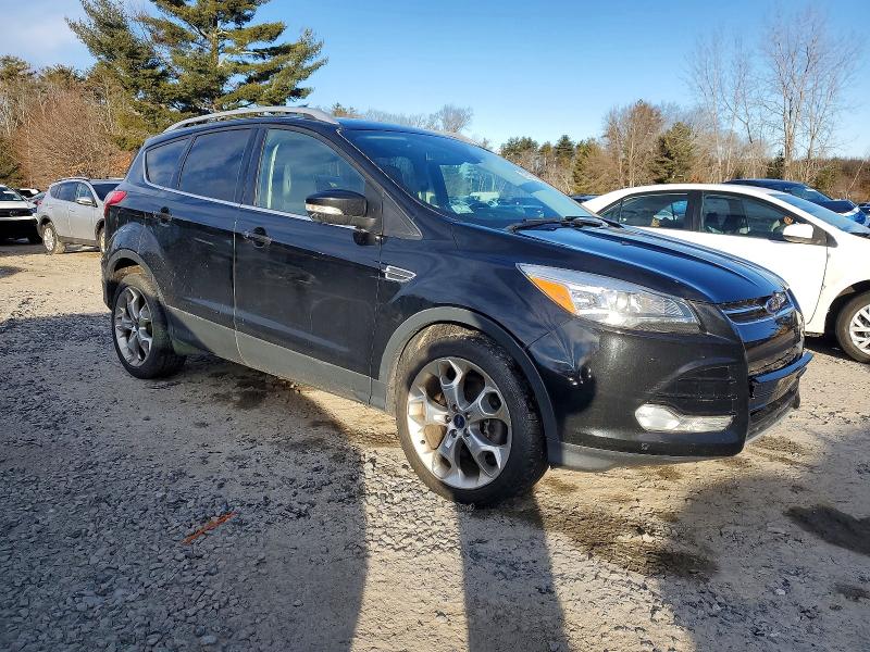 Photo 4 from auction – 2016 FORD ESCAPE TIT with VIN 1FMCU9J91GUB85547