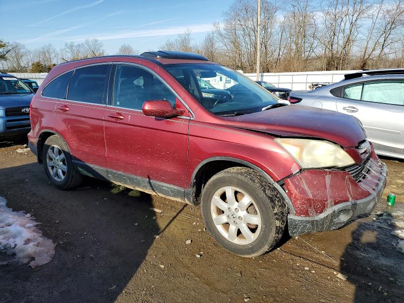 Photo 4 from auction – 2009 HONDA CR-V EXL with VIN 5J6RE38769L035692