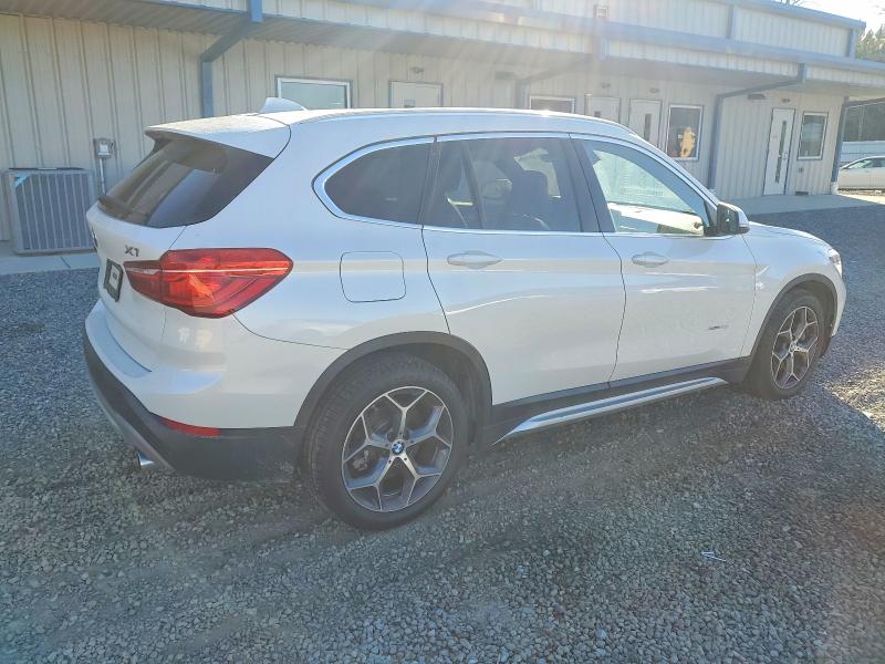 Photo 3 from auction – 2016 BMW X1 XDRIVE2 with VIN WBXHT3C35G5E47508