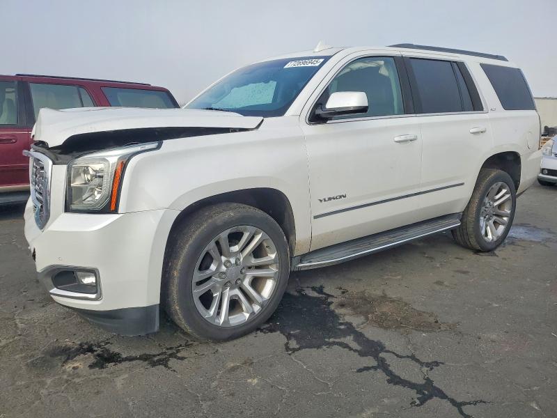 GMC YUKON SLT 2019 with VIN 1GKS1BKC7KR309198 - Photo from auction