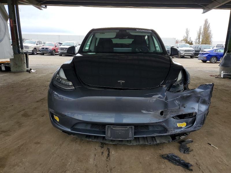 Photo 5 from auction – 2022 TESLA MODEL Y with VIN 7SAYGDEE8NF402502