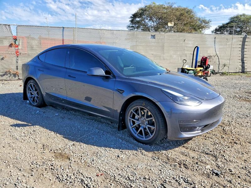 Photo 4 from auction – 2022 TESLA MODEL 3 with VIN 5YJ3E1EA3NF122852