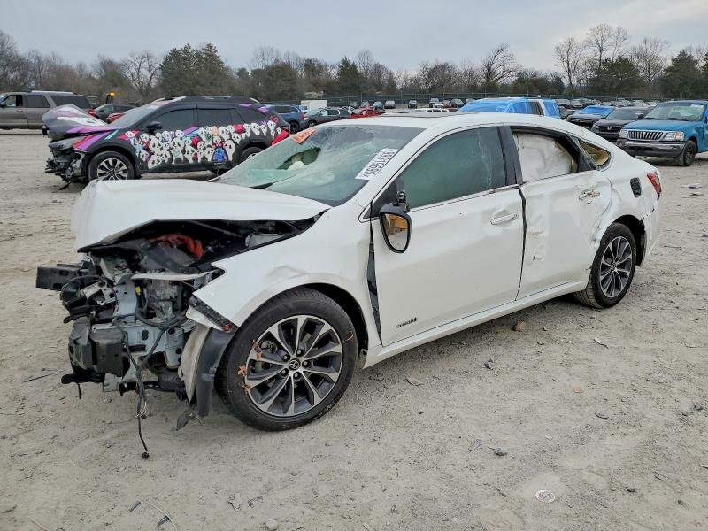 TOYOTA AVALON HYB 2017 with VIN 4T1BD1EB8HU058953 - Photo from auction