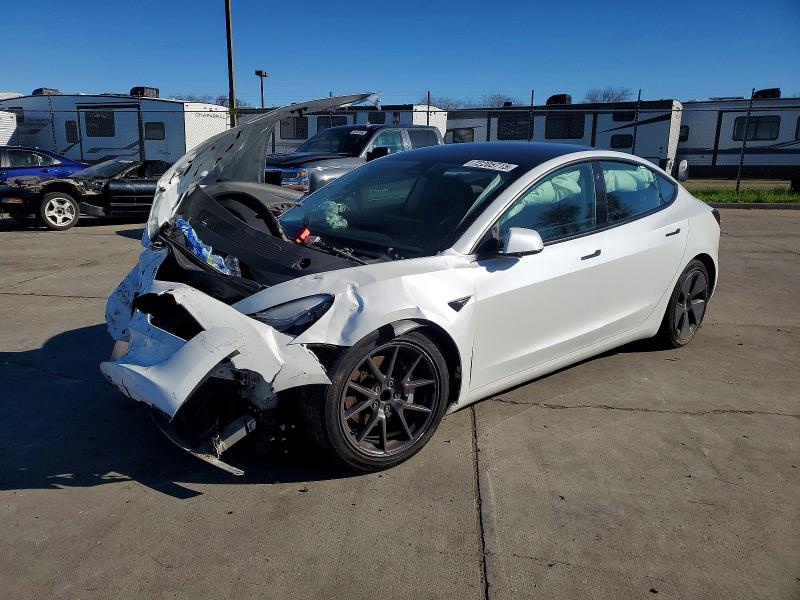 TESLA MODEL 3 2021 with VIN 5YJ3E1EAXMF939475 - Photo from auction