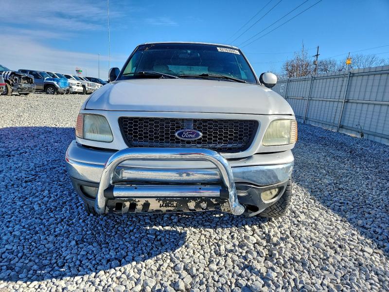 Photo 5 from auction – 2002 FORD F150 with VIN 1FTRX18L72NA37852