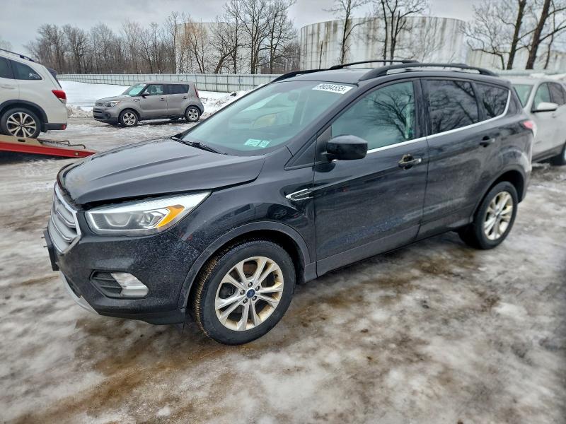 FORD ESCAPE SE 2017 with VIN 1FMCU9G9XHUD33008 - Photo from auction