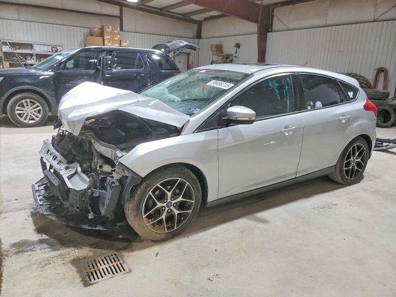 FORD FOCUS 2017 with VIN 1FADP3M29HL302090 - Photo from auction
