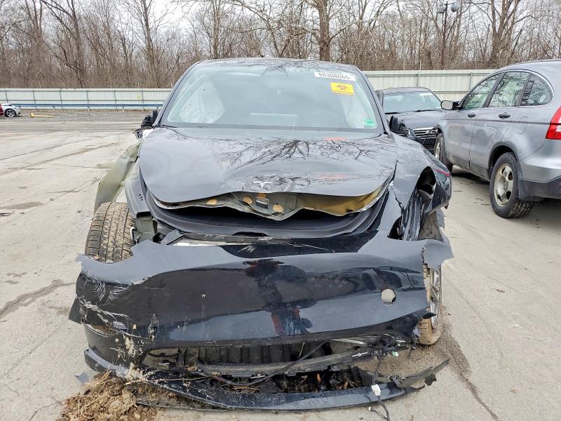 Photo 5 from auction – 2023 TESLA MODEL Y with VIN 7SAYGDEE1PF690656