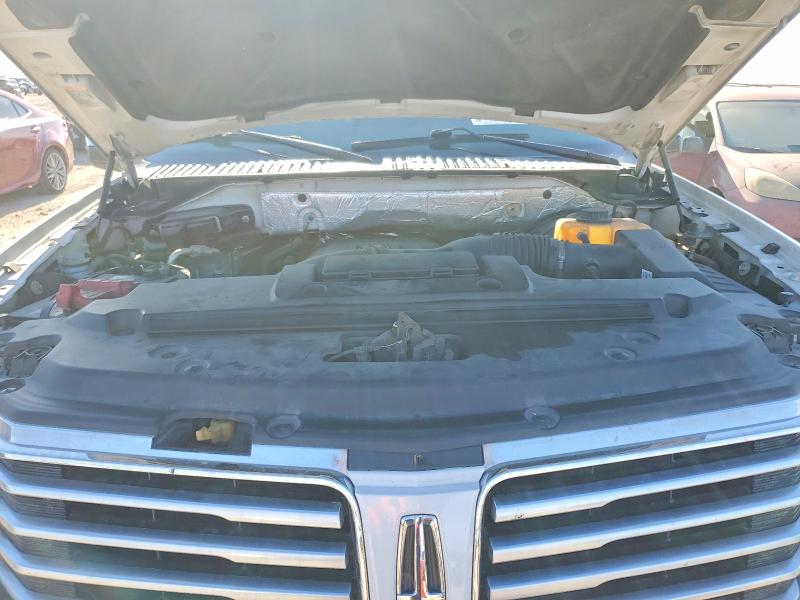 Photo 11 from auction – 2015 LINCOLN NAVIGATOR with VIN 5LMJJ2HT7FEJ10348
