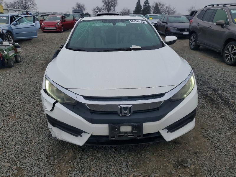Photo 5 from auction – 2018 HONDA CIVIC LX with VIN 2HGFC4B07JH300025