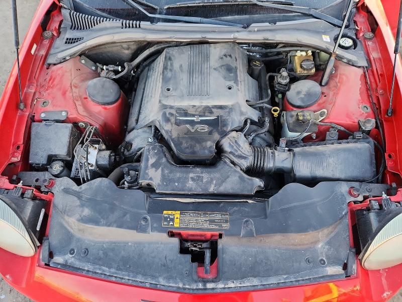 Photo 11 from auction – 2005 FORD THUNDERBIR with VIN 1FAHP60A05Y100060