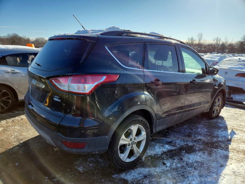 Photo 3 from auction – 2013 FORD ESCAPE SE with VIN 1FMCU9G98DUB85273