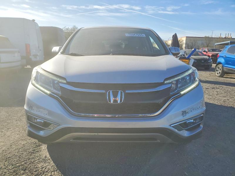Photo 5 from auction – 2015 HONDA CR-V EX with VIN 2HKRM3H5XFH510025