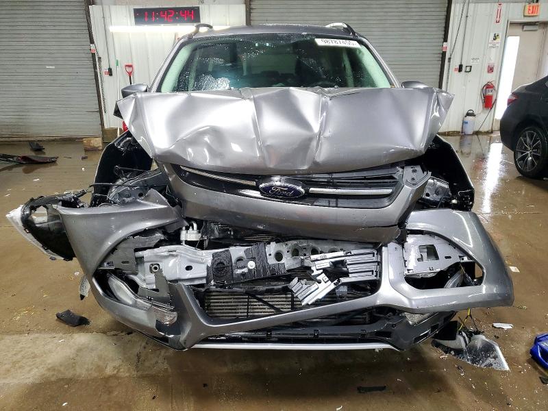 Photo 5 from auction – 2014 FORD ESCAPE with VIN 1FMCU9G9XEUB83817