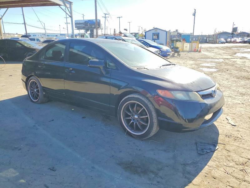 Photo 4 from auction – 2006 HONDA CIVIC LX with VIN 1HGFA16516L130913