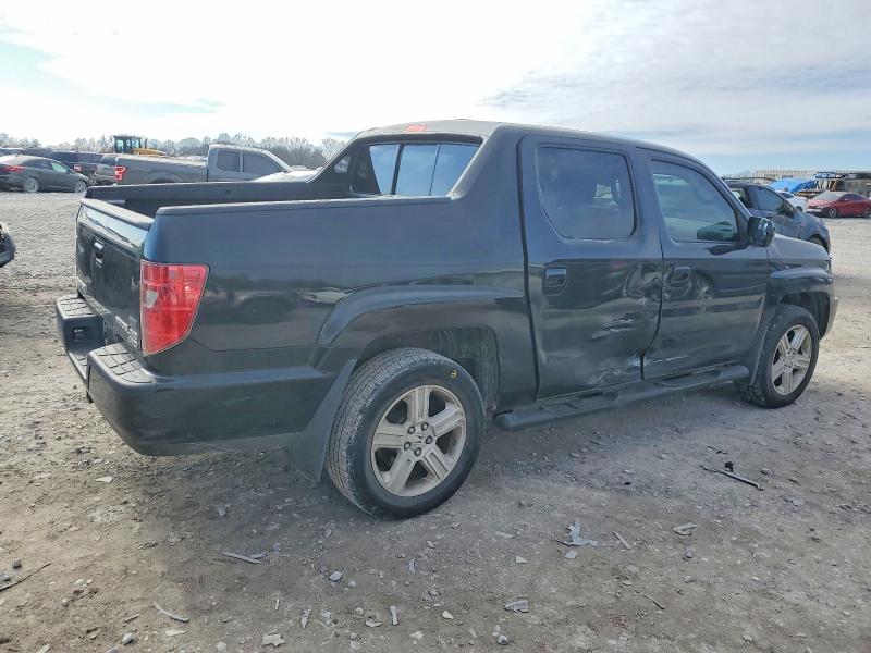 Photo 3 from auction – 2011 HONDA RIDGELINE with VIN 5FPYK1F50BB005703
