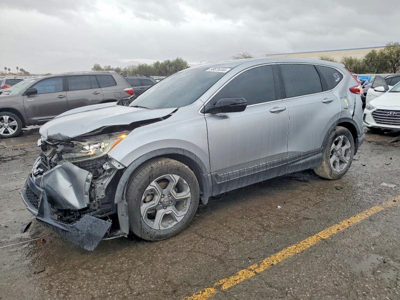 Photo 1 from auction – 2017 HONDA CR-V with VIN 7FARW1H8XHE029917