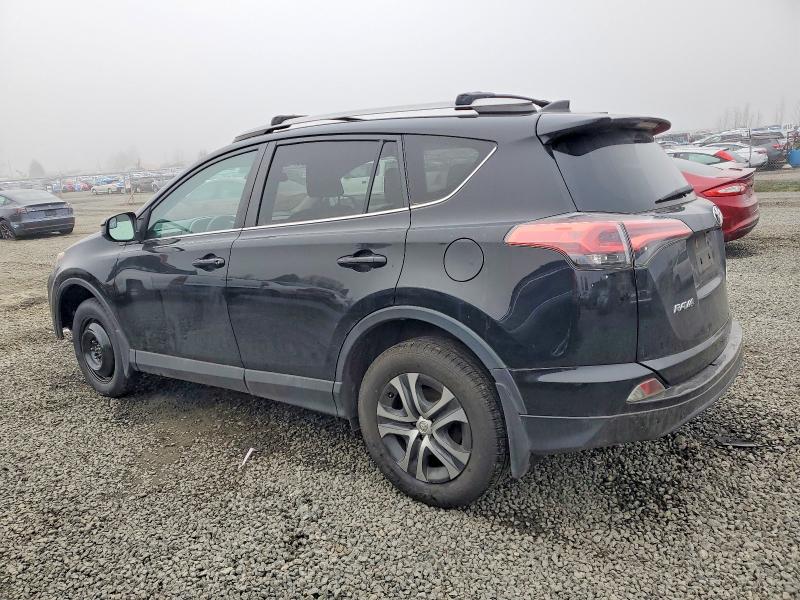 Photo 2 from auction – 2018 TOYOTA RAV4 LE with VIN 2T3BFREV7JW808942