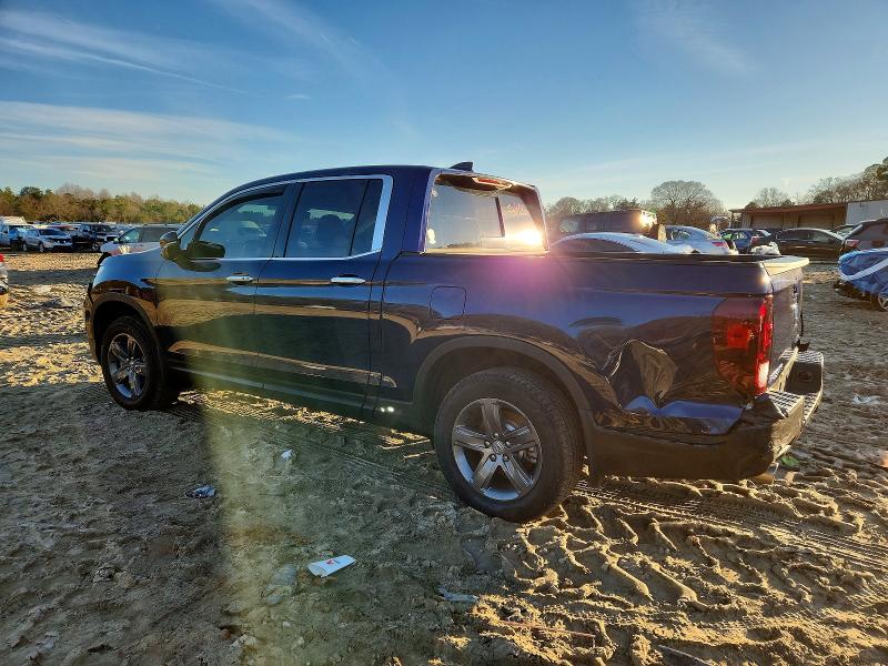 Photo 2 from auction – 2023 HONDA RIDGELINE with VIN 5FPYK3F76PB043389