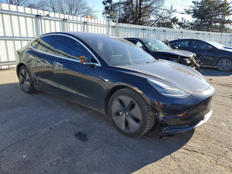 Photo 4 from auction – 2018 TESLA MODEL 3 with VIN 5YJ3E1EB2JF070844