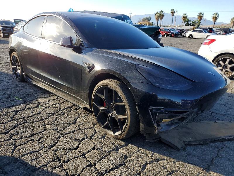 Photo 4 from auction – 2022 TESLA MODEL 3 with VIN 5YJ3E1EA0NF299228