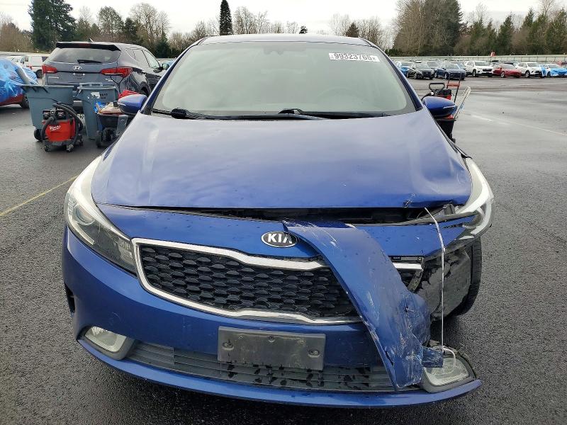Photo 5 from auction – 2017 KIA FORTE with VIN 3KPFL4A87HE093325