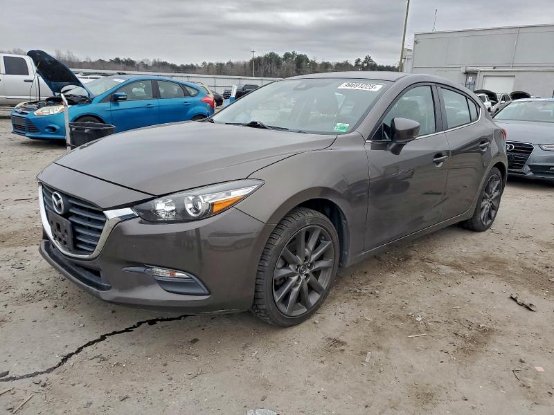 MAZDA 3 TOURING 2018 with VIN 3MZBN1L37JM183883 - Photo from auction