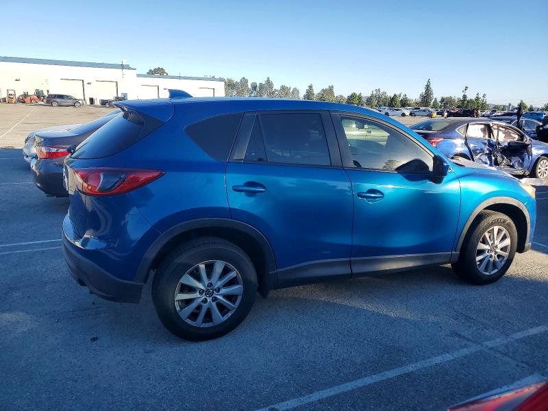 Photo 3 from auction – 2014 MAZDA CX-5 with VIN JM3KE2CY6E0375607