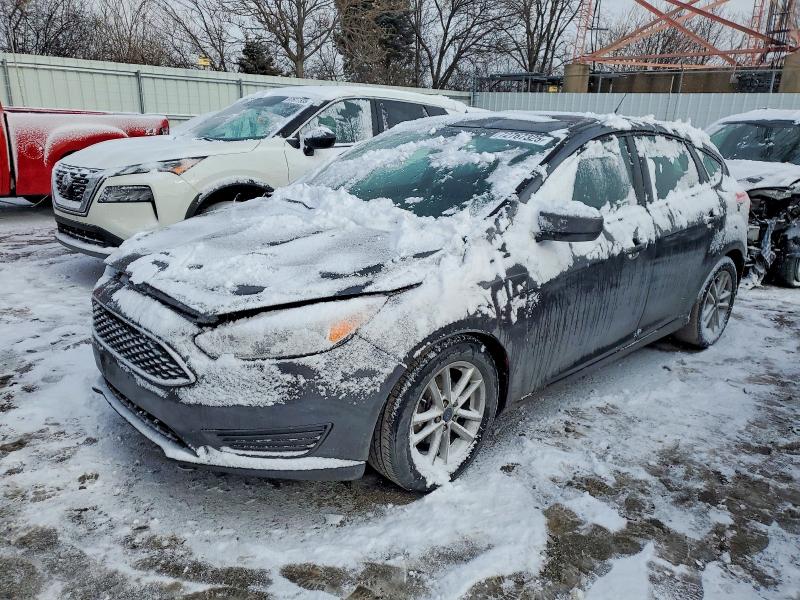 FORD FOCUS SE 2018 with VIN 1FADP3K20JL257260 - Photo from auction
