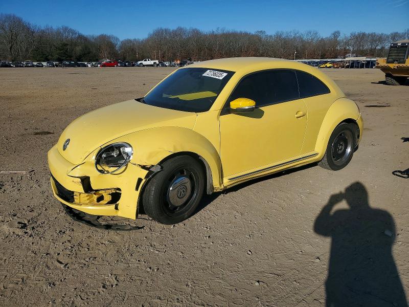 VOLKSWAGEN BEETLE 2012 with VIN 3VWJP7AT2CM602706 - Photo from auction