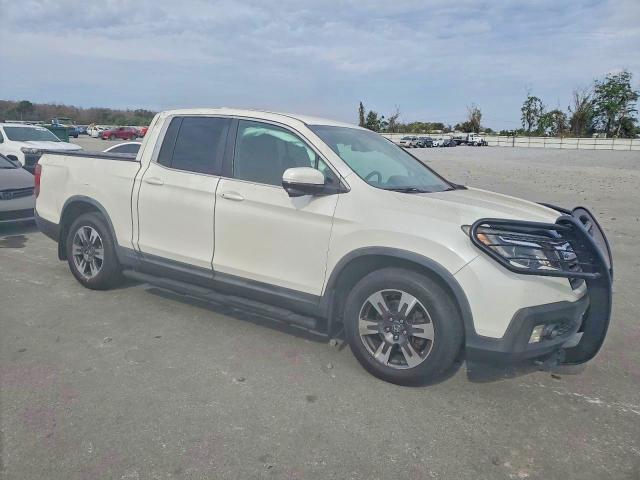 Photo 4 from auction – 2017 HONDA RIDGELINE with VIN 5FPYK2F65HB009558