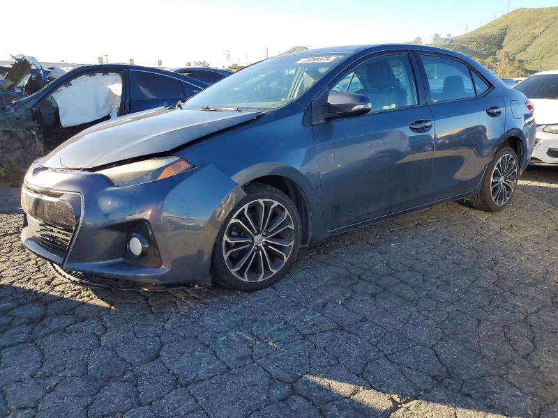 TOYOTA COROLLA L 2014 with VIN 5YFBURHE0EP121495 - Photo from auction