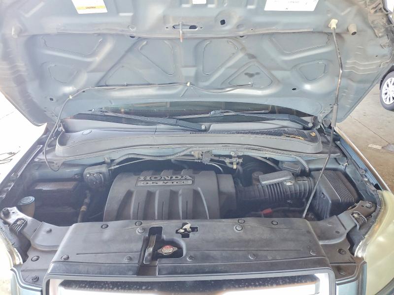 Photo 12 from auction – 2006 HONDA PILOT EX with VIN 2HKYF18536H565099
