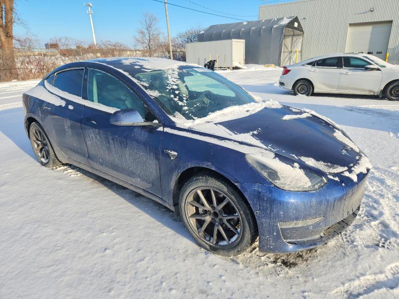 Photo 4 from auction – 2021 TESLA MODEL 3 with VIN 5YJ3E1EA0MF031133