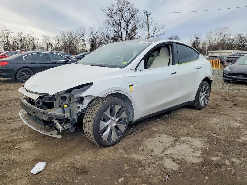 TESLA MODEL Y 2023 with VIN 7SAYGAEE1PF782901 - Photo from auction