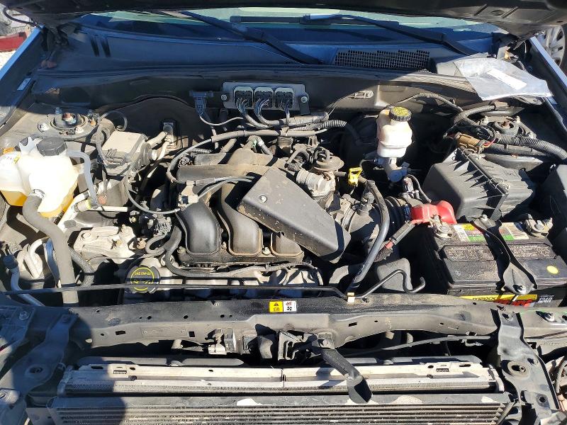 Photo 12 from auction – 2008 FORD ESCAPE XLT with VIN 1FMCU03128KB99103