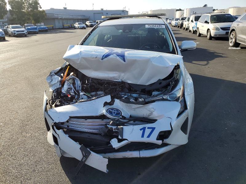 Photo 5 from auction – 2018 TOYOTA PRIUS with VIN JTDKBRFU7J3081600