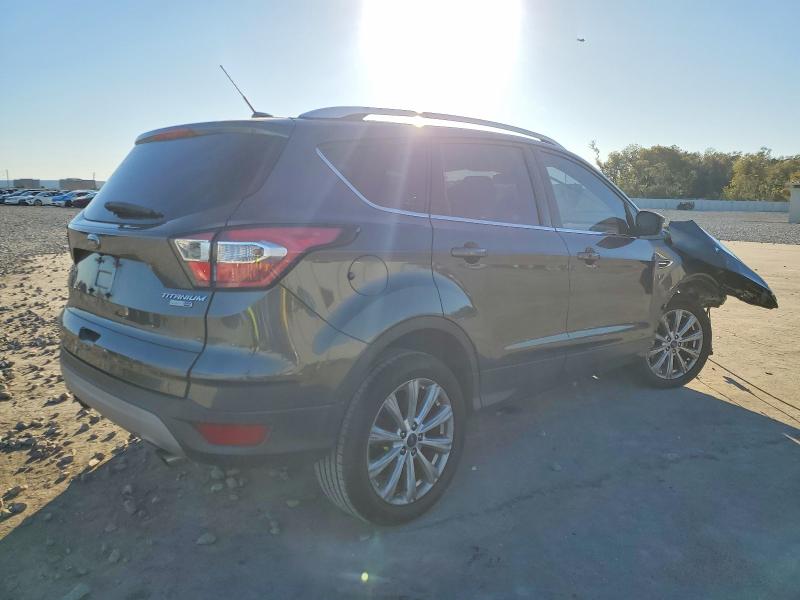 Photo 3 from auction – 2017 FORD ESCAPE TIT with VIN 1FMCU9JD8HUD21422