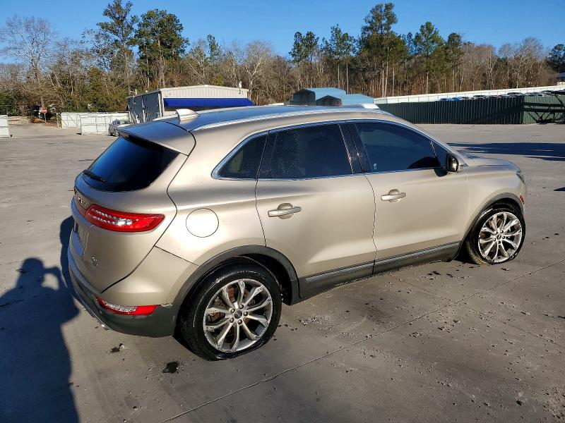 Photo 3 from auction – 2015 LINCOLN TOWNHOUSE MKC with VIN 5LMCJ1A90FUJ23014