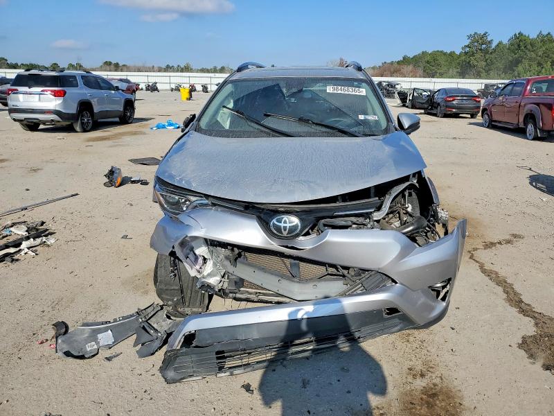 Photo 12 from auction – 2018 TOYOTA RAV4 with VIN JTMWFREV2JJ199761