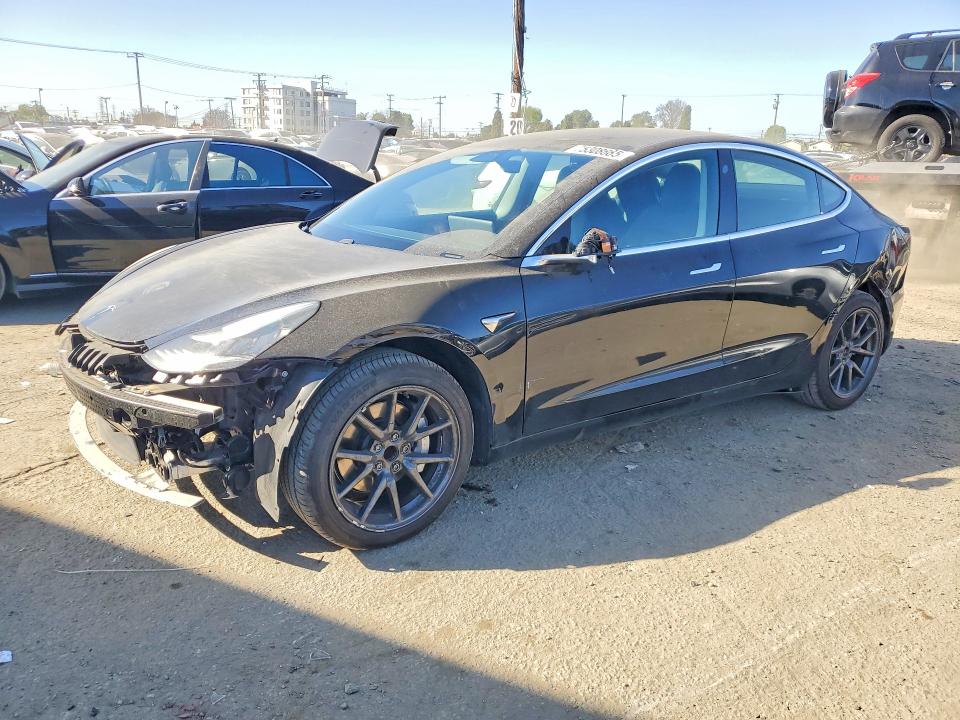TESLA MODEL 3 2019 with VIN 5YJ3E1EA1KF399656 - Photo from auction