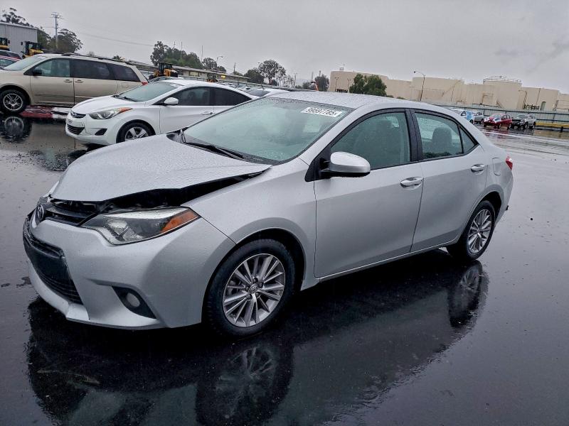 TOYOTA COROLLA L 2014 with VIN 5YFBURHE3EP106103 - Photo from auction