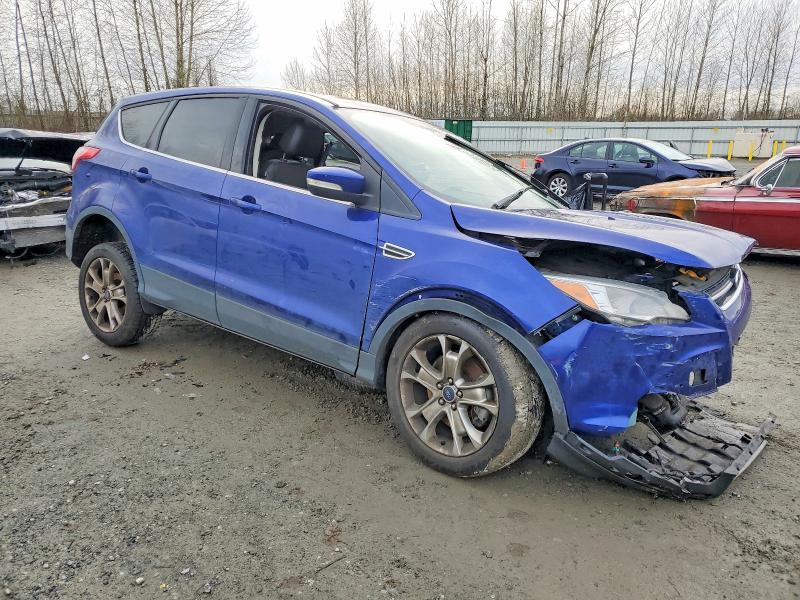 Photo 4 from auction – 2013 FORD ESCAPE with VIN 1FMCU9H92DUA60462