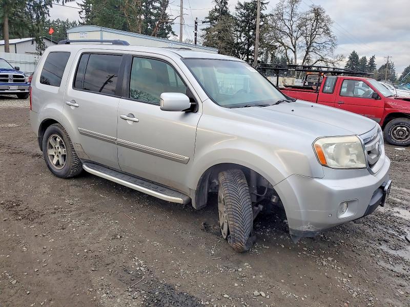 Photo 4 from auction – 2011 HONDA PILOT TOUR with VIN 5FNYF3H90BB013616