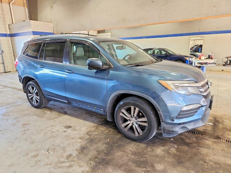 Photo 4 from auction – 2016 HONDA PILOT EXL with VIN 5FNYF6H52GB121466