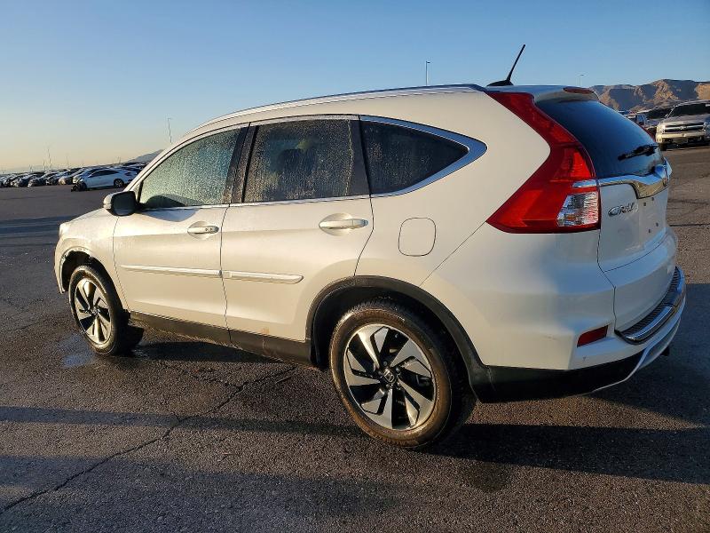 Photo 2 from auction – 2015 HONDA CR-V TOURI with VIN 5J6RM4H98FL096399